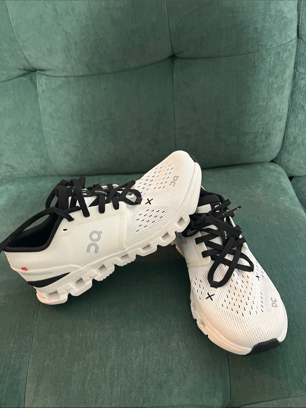 On Running Women's Cloud Sneakers in White and Black
